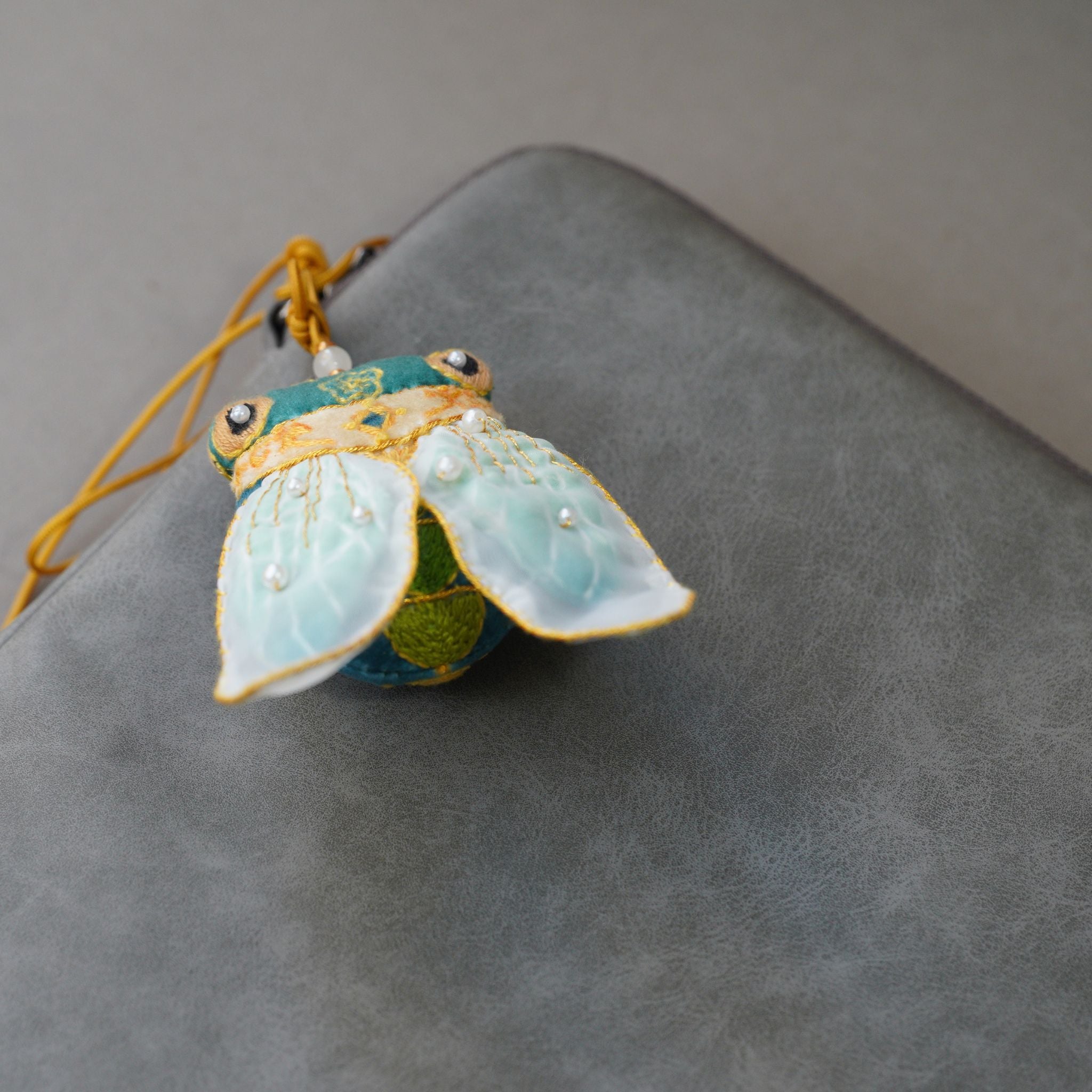 CicadaEmbroidery DIY Kit for Beginners, Unique Auspicious Fabric sachet with auspicious cicada design. Free international delivery for orders over $100.